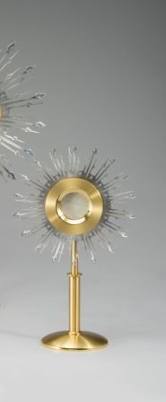 27-1/2" height, 17-1/2" diameter head, 18" base, holds 5-3/4" host, luna included, finished in combination satin and polished 24kt gold plate, silver oxidized rays, protective lacquer
